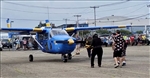 Batso pulls 1967 Cessna airplane with neck on 90 Birthday at CT Air and Space Center