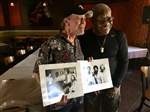 Wayne & Jaimoe holding SharpShooter Band photos