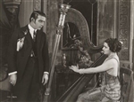 Nita Naldi & Rudolf Valentino in "Blood & Sand" (Yes - She played the harp!)