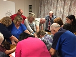 Ministry team praying over the Needs of Prayer Line Callers